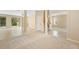 Spacious living area with carpet, abundant natural light, and an easy transition to other living spaces at 227 Blue Crystal Dr, Deland, FL 32720