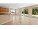 Open living space with a view of the garden and outdoor access at 227 Blue Crystal Dr, Deland, FL 32720