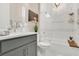 This bathroom features a vanity, commode, and bathtub shower combo at 241 Old Moss Cir, Deland, FL 32724
