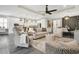 Open concept living space with recessed lighting, neutral decor and seamless flow into other areas at 241 Old Moss Cir, Deland, FL 32724