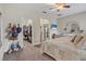 Bedroom with walk-in closet and access to ensuite bathroom at 2412 Regency Park Dr, Deland, FL 32724