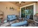 Relaxing screened patio features a fire pit, grill, and comfortable seating perfect for leisure at 2412 Regency Park Dr, Deland, FL 32724