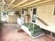Covered back porch includes a washer, dryer, and water heater at 2647 Brookline Ave, New Smyrna Beach, FL 32168