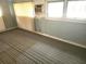 Bedroom with carpet, blinds, and A/C unit at 2647 Brookline Ave, New Smyrna Beach, FL 32168