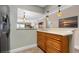 Updated kitchen with stainless steel appliances, wooden cabinets and a breakfast bar at 2711 N Halifax Ave # 264, Daytona Beach, FL 32118