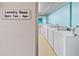 Clean laundry room with multiple washers and dryers, available from 7am to 8pm at 2711 N Halifax Ave # 264, Daytona Beach, FL 32118