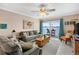 Cozy living room with a large windows, comfortable seating, and scenic water views at 2711 N Halifax Ave # 264, Daytona Beach, FL 32118