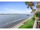 Scenic view of a calm waterfront with lush greenery and a private dock at 2711 N Halifax Ave # 264, Daytona Beach, FL 32118