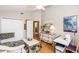 Cozy bedroom includes hardwood flooring, vaulted ceiling, and double closets at 275 Bayou Cir, Debary, FL 32713
