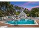 Beautiful community pool with a spacious deck area and clubhouse, perfect for relaxation and recreation at 275 Bayou Cir, Debary, FL 32713
