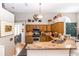 Well-equipped kitchen featuring granite countertops, stainless steel appliances, and ample cabinet space at 275 Bayou Cir, Debary, FL 32713