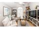 Spacious living room with hardwood flooring, vaulted ceiling, and modern decor at 275 Bayou Cir, Debary, FL 32713
