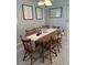 Traditional dining room featuring a beautiful wood table and matching chairs at 2898 Ocean Shore Blvd # 603, Ormond Beach, FL 32176