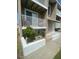 A welcoming condo exterior featuring a private balcony and well-maintained landscaping at 2898 Ocean Shore Blvd # 603, Ormond Beach, FL 32176
