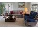 Comfortable living room featuring classic furnishings, carpet, and a view of the outdoors at 2898 Ocean Shore Blvd # 603, Ormond Beach, FL 32176