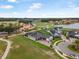 An aerial view of a home situated in a golf community at 2948 Bella Flore Ter, New Smyrna Beach, FL 32168