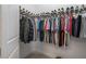 This walk-in closet has custom racks for shoes, clothes and accessories at 2948 Bella Flore Ter, New Smyrna Beach, FL 32168