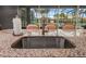 Close up view of kitchen sink with granite countertops and a view of the backyard and pool at 2948 Bella Flore Ter, New Smyrna Beach, FL 32168