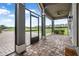 Open patio with brick pavers overlooking the golf course at 2948 Bella Flore Ter, New Smyrna Beach, FL 32168