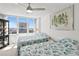 Inviting bedroom with two beds, complemented by large windows offering a view of the city skyline at 2987 S Atlantic Ave # 901, Daytona Beach, FL 32118