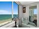 Inviting room view with ocean scenery, comfortable chair, and stylish decor at 2987 S Atlantic Ave # 901, Daytona Beach, FL 32118