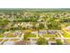 Aerial view of the neighborhood showcasing the home's location among lush greenery at 3035 Victory Palms Dr, Edgewater, FL 32141