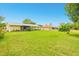 Expansive backyard provides ample green space between neighboring houses at 3035 Victory Palms Dr, Edgewater, FL 32141