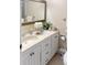 Bright bathroom featuring a large vanity, neutral color palette and decorative accents at 3043 S Atlantic Ave # 204, Daytona Beach, FL 32118