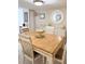 Comfortable dining room with light walls, a table with six chairs, and tasteful decor at 3043 S Atlantic Ave # 204, Daytona Beach, FL 32118