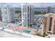Aerial view of the condominium complex with direct beach access and access to a beach front swimming pool at 3043 S Atlantic Ave # 204, Daytona Beach, FL 32118