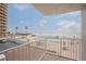 This beachfront balcony offers ocean views and a look at the community pool and lounging area at 3043 S Atlantic Ave # 204, Daytona Beach, FL 32118