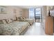 Bedroom featuring two beds and ocean views at 3043 S Atlantic Ave # 204, Daytona Beach, FL 32118