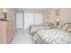 This bedroom features two beds, ample closet space, and neutral tones at 3043 S Atlantic Ave # 204, Daytona Beach, FL 32118