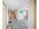 Hallway leading to elevators and resident doors at 3043 S Atlantic Ave # 204, Daytona Beach, FL 32118