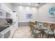 Convenient kitchenette and common seating area for light meals and socializing at 3043 S Atlantic Ave # 204, Daytona Beach, FL 32118