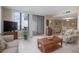 Bright living room connects to a balcony with ocean views and has a dining area at 3043 S Atlantic Ave # 204, Daytona Beach, FL 32118