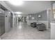 Condominium lobby area with elevator access, seating, decorative art and interior design at 3043 S Atlantic Ave # 204, Daytona Beach, FL 32118