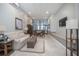 Bright resident lounge with comfortable seating, a TV, and views of the ocean and pool at 3043 S Atlantic Ave # 204, Daytona Beach, FL 32118