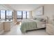 Tranquil main bedroom with ocean views and neutral decor at 3043 S Atlantic Ave # 204, Daytona Beach, FL 32118