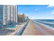 Stunning aerial view of the beachfront property with pools at 3047 S Atlantic Ave # 1805, Daytona Beach, FL 32118