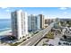 Stunning aerial view of modern beachfront condos along the ocean with ample parking at 3047 S Atlantic Ave # 1805, Daytona Beach, FL 32118