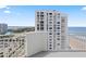 Private balcony offering stunning views of the ocean and adjacent building at 3047 S Atlantic Ave # 1805, Daytona Beach, FL 32118