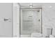 Updated shower with glass door, marble tiling, and modern fixtures in bathroom at 3047 S Atlantic Ave # 1805, Daytona Beach, FL 32118