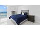 Comfortable bedroom with large window overlooking ocean view at 3047 S Atlantic Ave # 1805, Daytona Beach, FL 32118