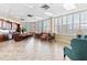 Spacious common area with seating, kitchen, and ample natural light at 3047 S Atlantic Ave # 1805, Daytona Beach, FL 32118