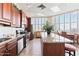 Modern kitchen featuring stainless steel appliances and a granite island at 3047 S Atlantic Ave # 1805, Daytona Beach, FL 32118