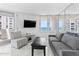 Comfortable living room with a large window and view at 3047 S Atlantic Ave # 1805, Daytona Beach, FL 32118