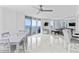 Open living room features a dining area, a sitting area and a balcony with ocean view at 3047 S Atlantic Ave # 1805, Daytona Beach, FL 32118