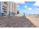 Rooftop patio with chairs and tables plus ocean views at 3047 S Atlantic Ave # 1805, Daytona Beach, FL 32118