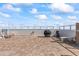 Rooftop patio with grill, ocean view and lounge seating at 3047 S Atlantic Ave # 1805, Daytona Beach, FL 32118
